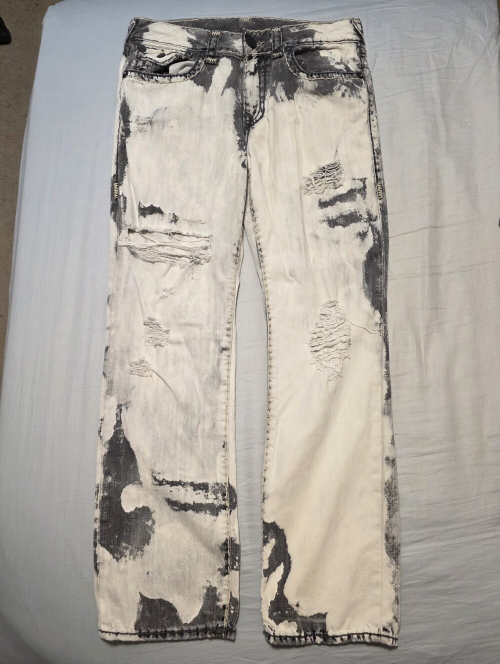 True Religion white and black distressed denim jeans